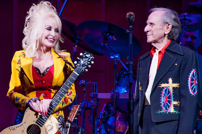 Dolly Parton presenting Don Warden with the Angel Award
